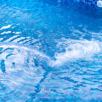 Filling,A,Newly,Installed,Pool,With,Water,With,A,Blue
